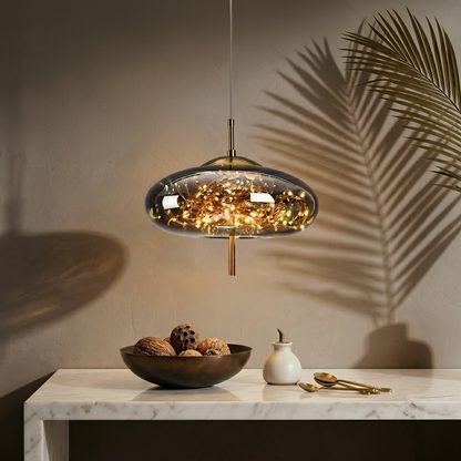 Smoky gray glass pendant light with dimensions on a neutral background